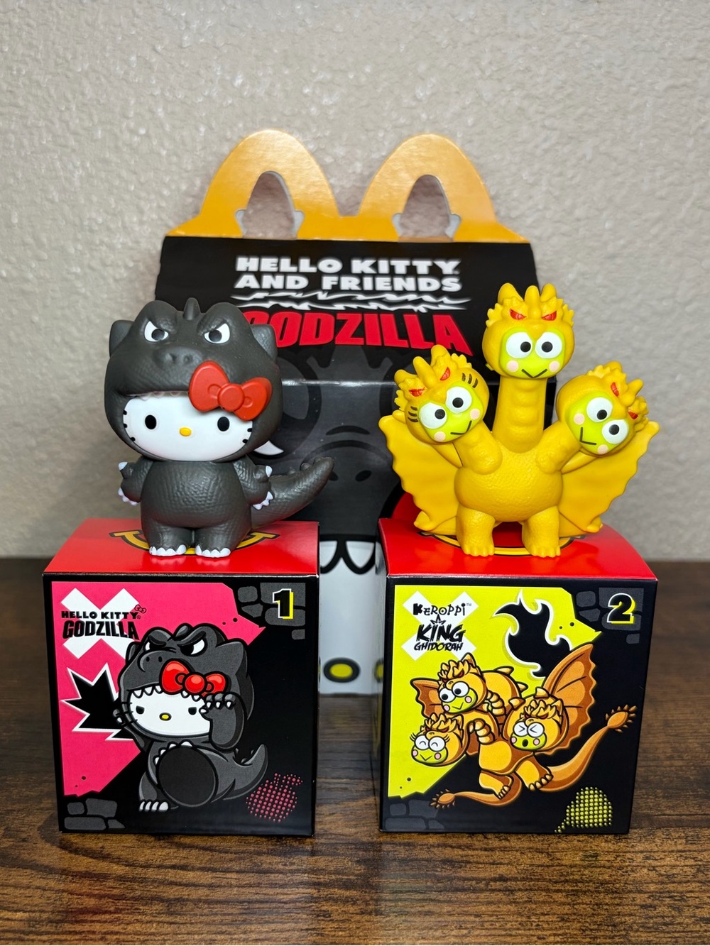 2026 McDonald #1 Hello Kitty Godzilla and #2 King Ghidorah Figure With Meal Box